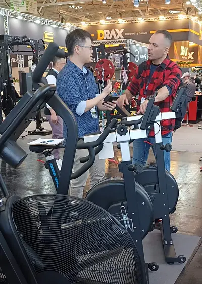 Visitors testing VEKTOR machine at FIBO 2025