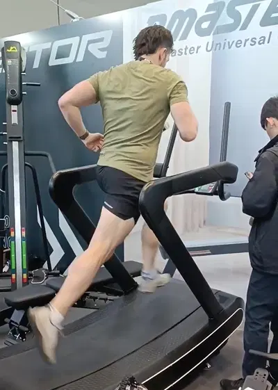 Curved treadmill demonstration at FIBO 2025
