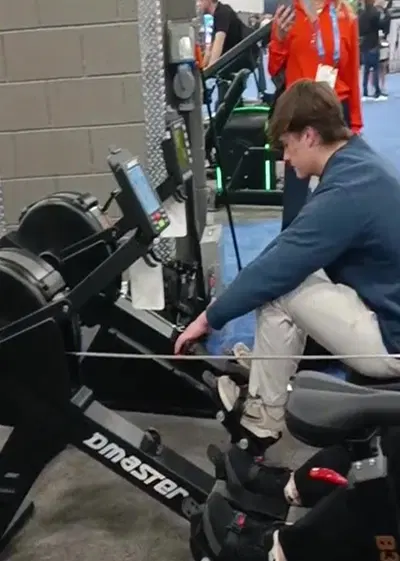 Visitor trying rower at HFA 2025